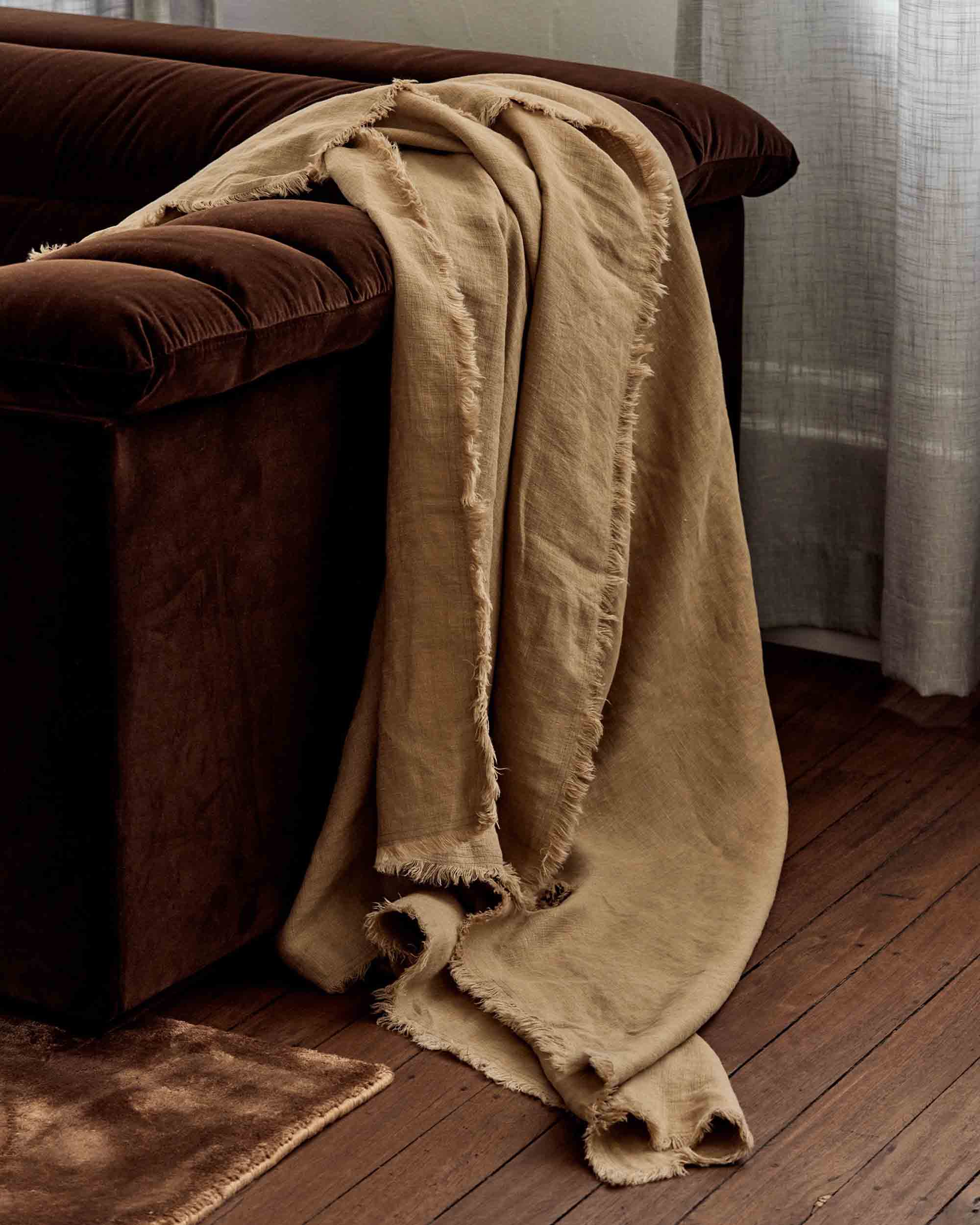 Oversized linen throw blanket in biscuit