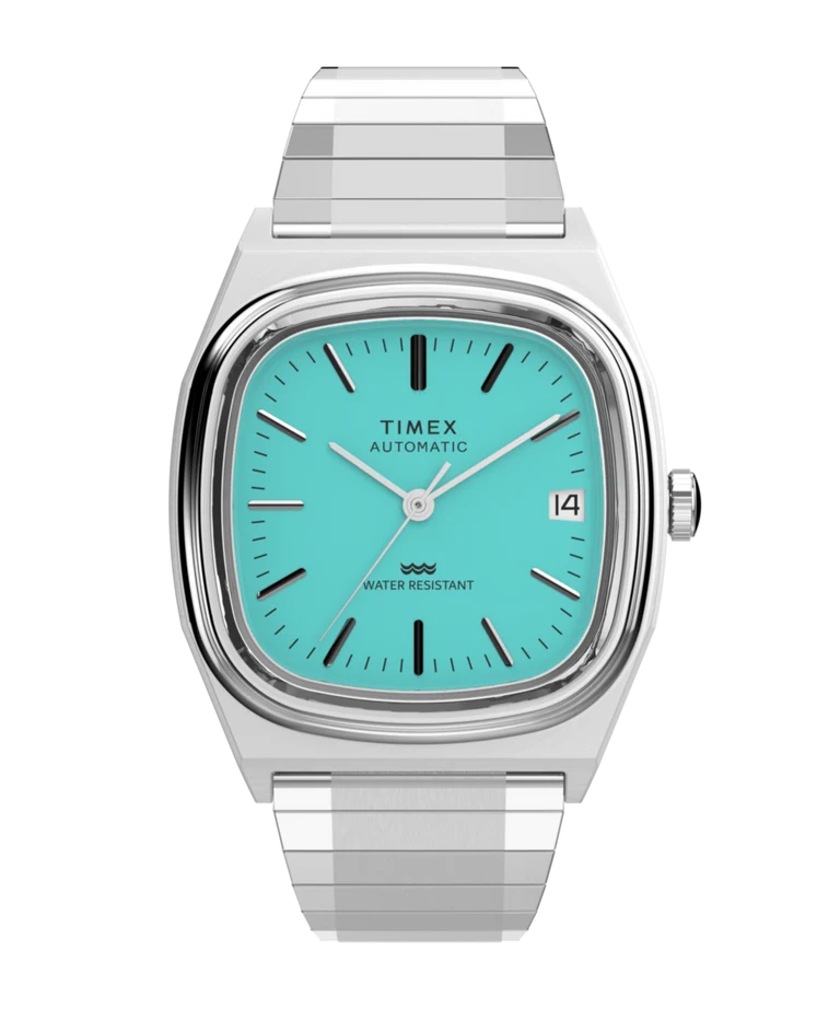 Timex E Line reissue automatic watch with a turquoise dial and steel expansion band